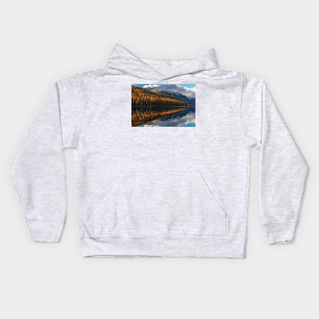 Mountain Peaks Reflect Into Bowman Lake In Autumn Glacier National Park Kids Hoodie by HammiltenJohn